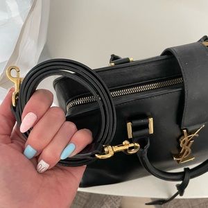 Saint Laurent YSL bag in black calfskin leather.